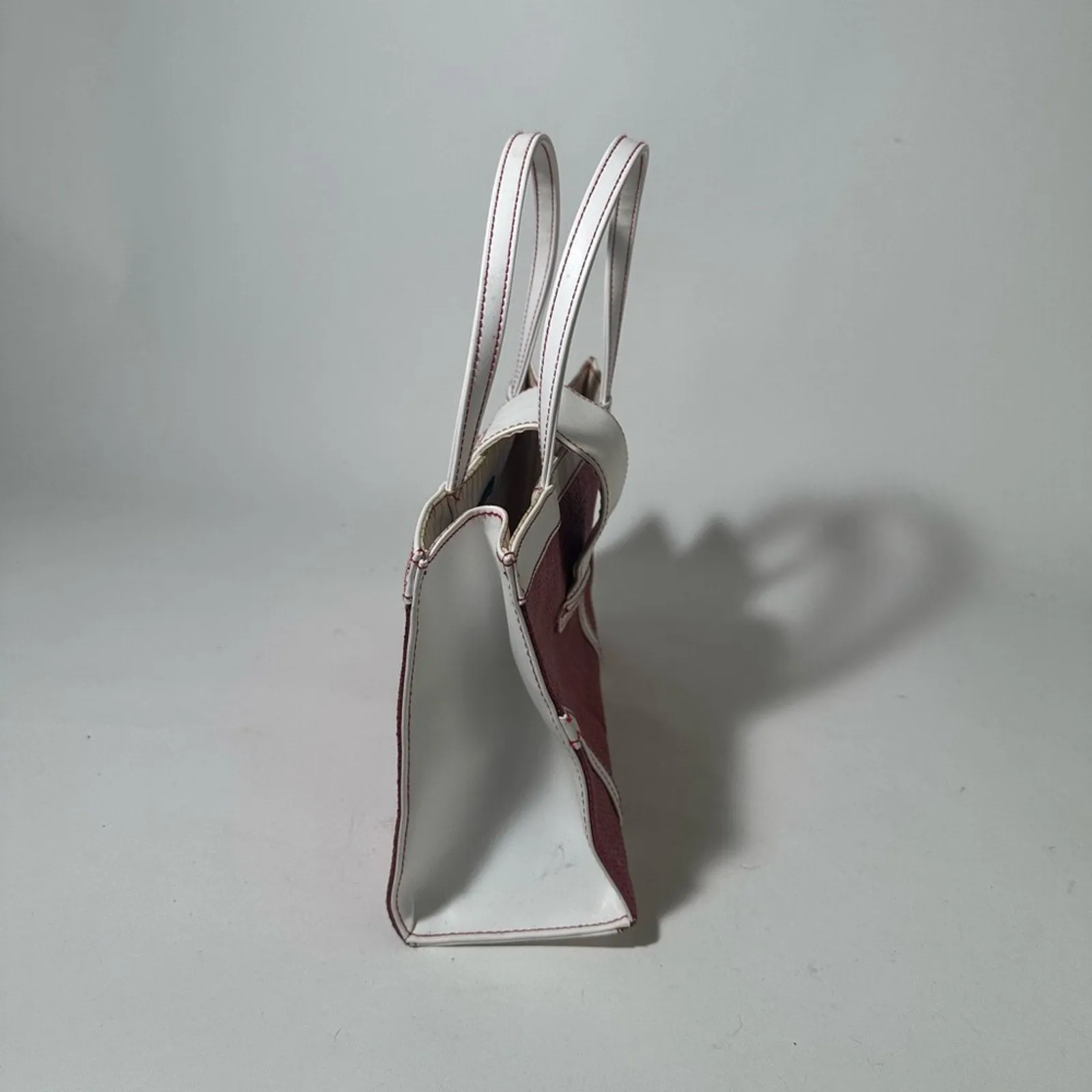 Red and White Structured Tote with Geometric Design
